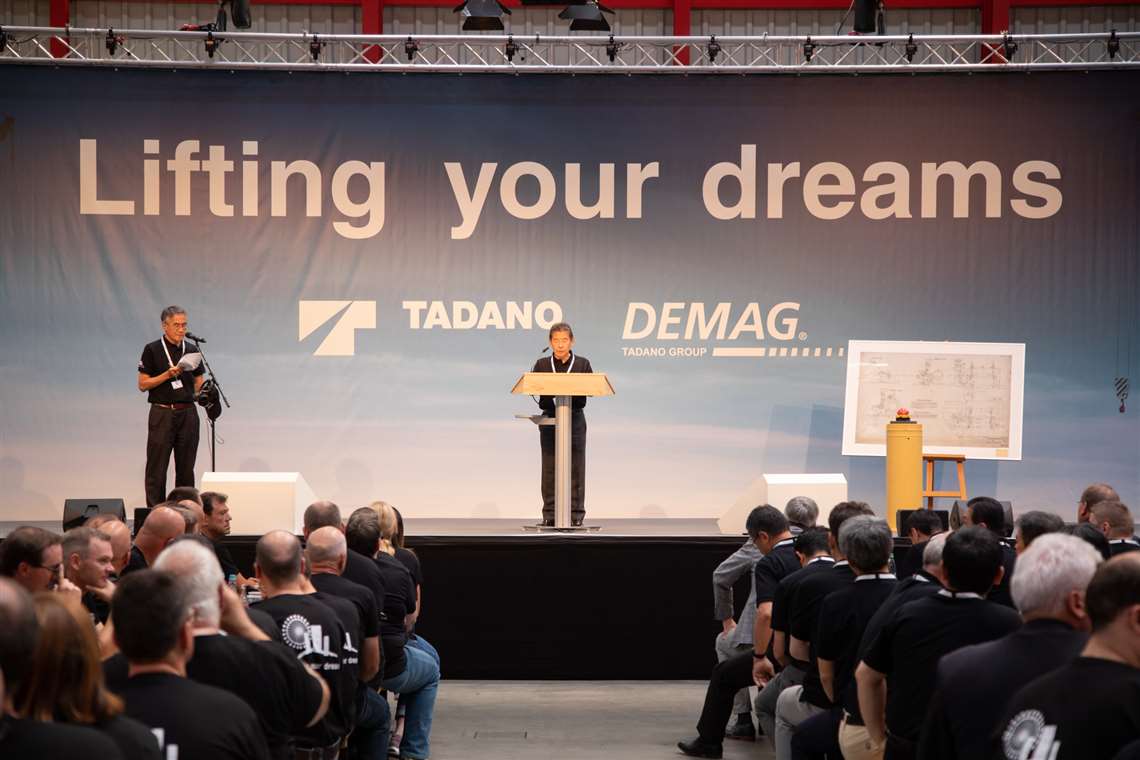 Koichi Tadano makes a speech on 01 August 2019, the first day of Tadano's ownership of Demag