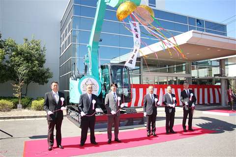 Kobelco executives begin ceremony at the company's Hiroshima factory in Japan.