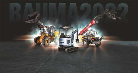 A range of construction machinery on backdrop with Bauma 2022 written behind